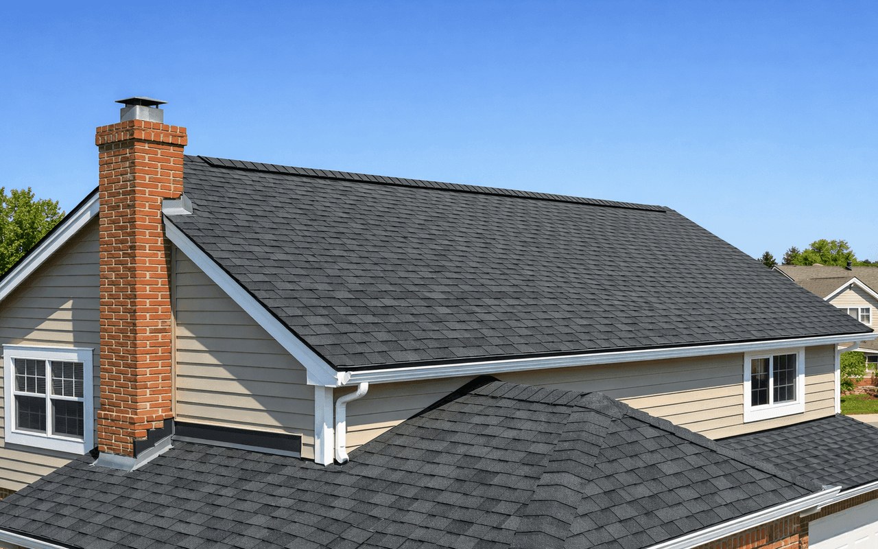 Newly installed charcoal architectural shingle roof with clean flashing for Roofing Upgrade